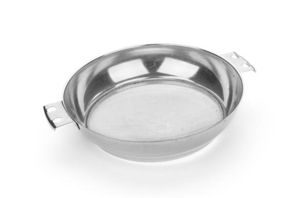 istock Metal sieve close up isolated on white background 1212982886