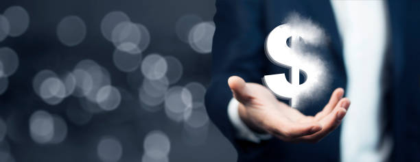 istock man hand dollar sign in screen 1212983140