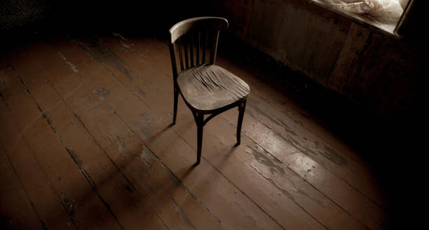 istock old chair on old and dark room 1212983401