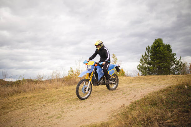 istock Rider clearing his mind with a ride on a dirt road 1212986710