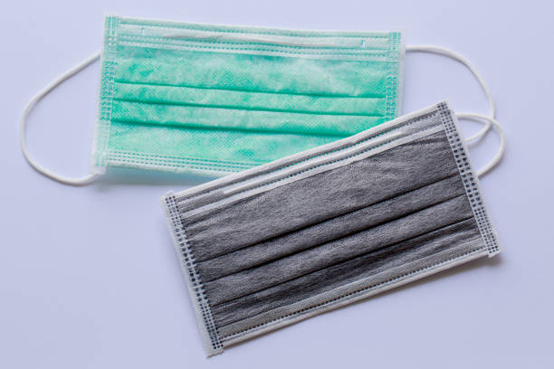 istock Hygienic mask carbon, Surgical mask on white background. 1212991018
