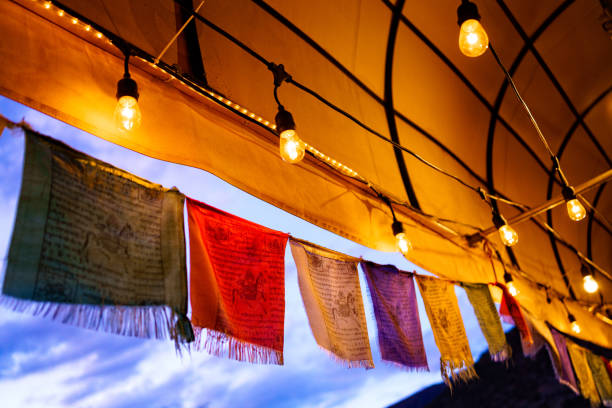 istock Tibetan Prayer Flags and Lights at Dusk 1212996530