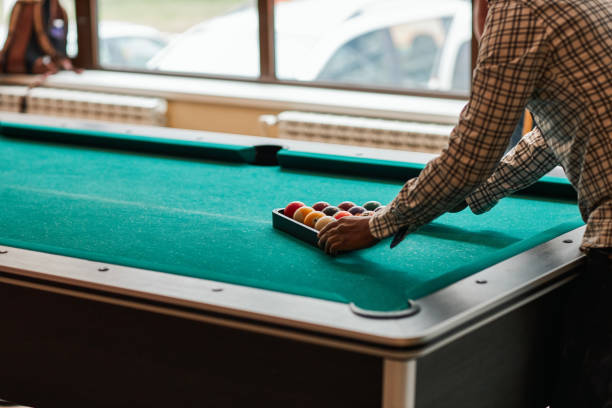 African Students Playing Pool In The Dorm