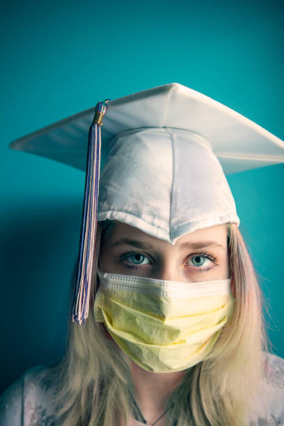 istock Close Up of Graduate in Protective Face Mask 1213002377