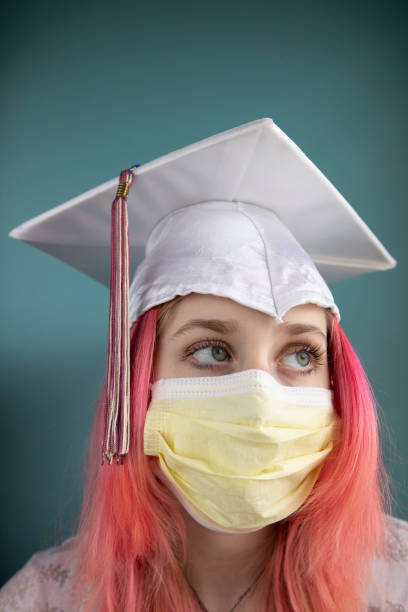 istock Class of 2020 Grad in Face Mask 1213002594