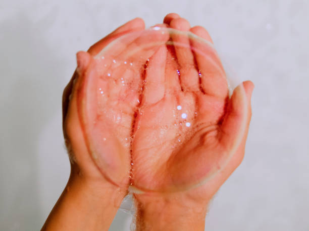 istock Child Wash hands making big bubble of soap 1213003737