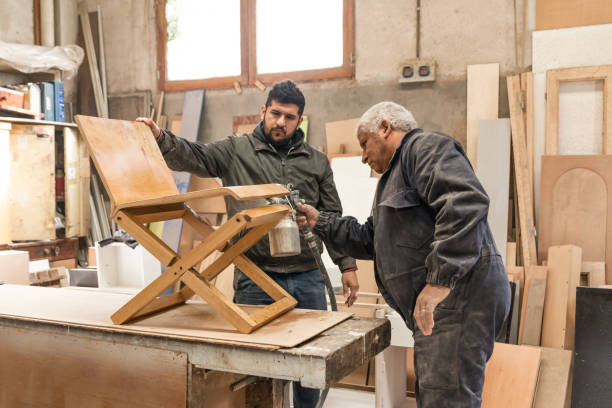 istock Carpenter working with wood in a lumberyard 1213004181