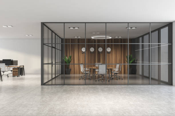 istock Wooden meeting room in white open space office 1213013613