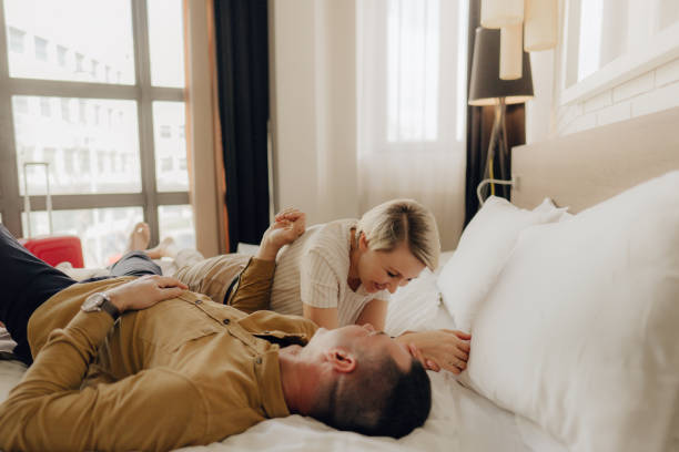 istock Couple in a hotel room 1213015860