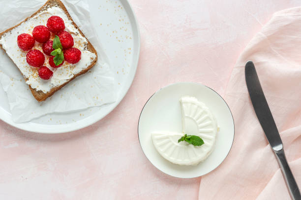 istock Toasted bread with fresh cheese and strawberries 1213019178