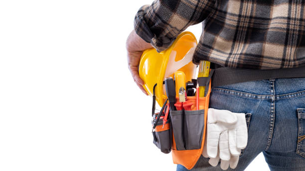 istock Electrician with tool belt on a white background. Electricity. 1213019483