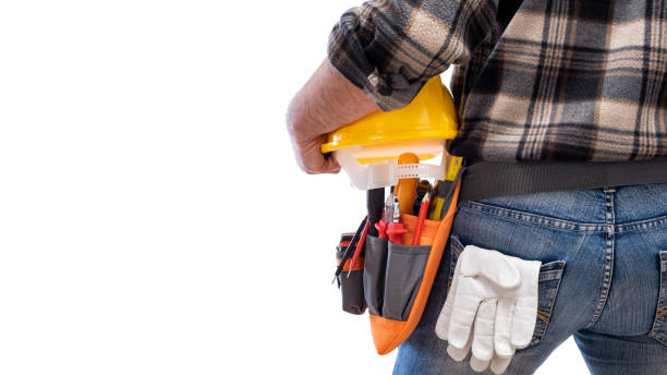 istock Electrician with tool belt on a white background. Electricity. 1213019488