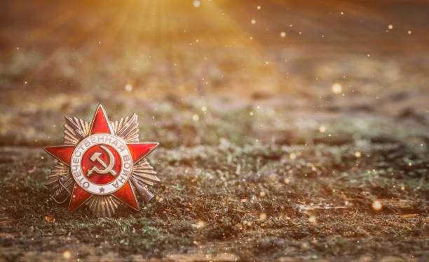 9 may Victory Day composition with Soviet medal on which is pritten in Russian "Patriotic War" on moss background The Soviet order of the Second World war on natural moss background, Victory Day 9 May postcard concept with copy space 1945 stock pictures, royalty-free photos & images