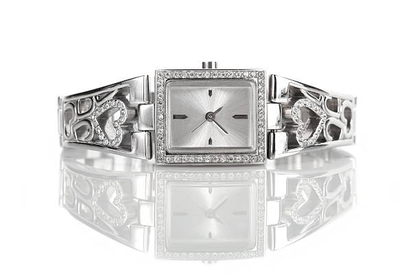 Female wrist watch with diamonds with reflection