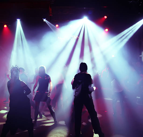 istock Silhouettes of dancing teenagers 121302913