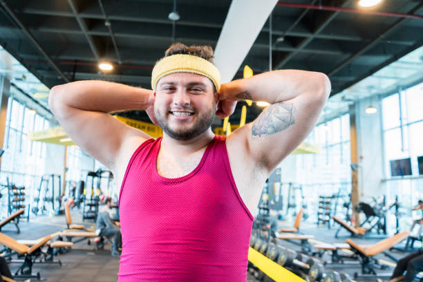 istock Funny man at the gym 1213031317