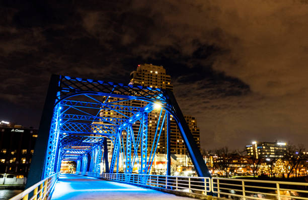 istock Blue Bridge at night lit up in Grand Rapids Michigan 1213036918