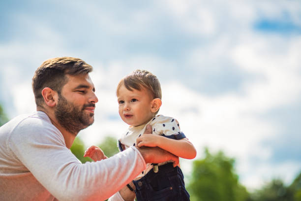 istock Father and son,enjoying in nature 1213037975