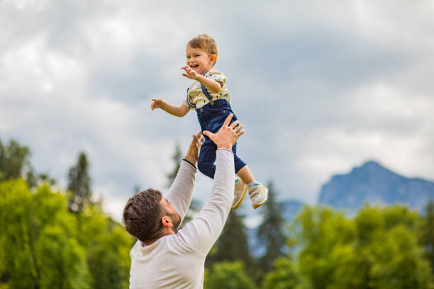 istock Father and son,enjoying in nature 1213038592