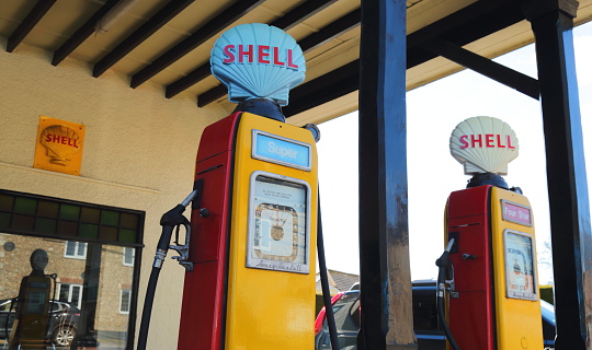 COLYFORD, DEVON, UK- MARCH 16, 2020: Vintage petrol filling station in village of Colyford, Devon, was built in 1927-8. Shell provided petrol to the station using 1950s Avery Hardoll pumps.