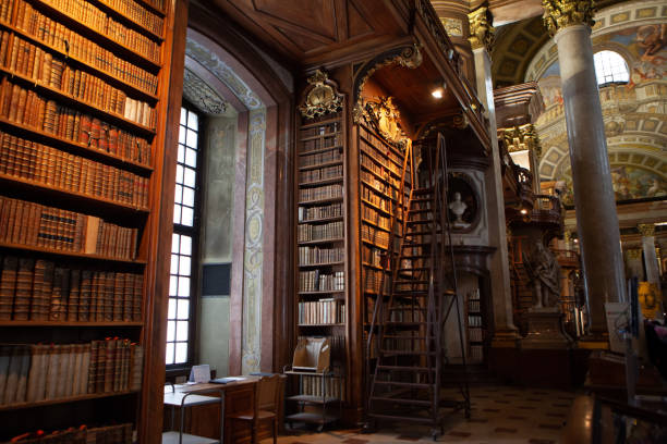29 February 2020 , Wien Austria..The Austrian National Library (German: Österreichische Nationalbibliothek) is the largest library in Austria, with more than 12 million items in its various collections. The library is located in the Neue Burg Wing of the Hofburg in center of Vienna. Since 2005, some of the collections have been relocated within the Baroque structure of the Palais Mollard-Clary. Founded by the Habsburgs, the library was originally called the Imperial Court Library