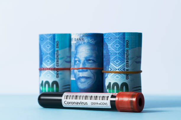 istock Coronavirus test tube and South African rand 1213044979