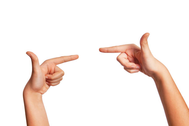 istock Close-up - a woman's hand and finger on a white background is pointing 1213045876
