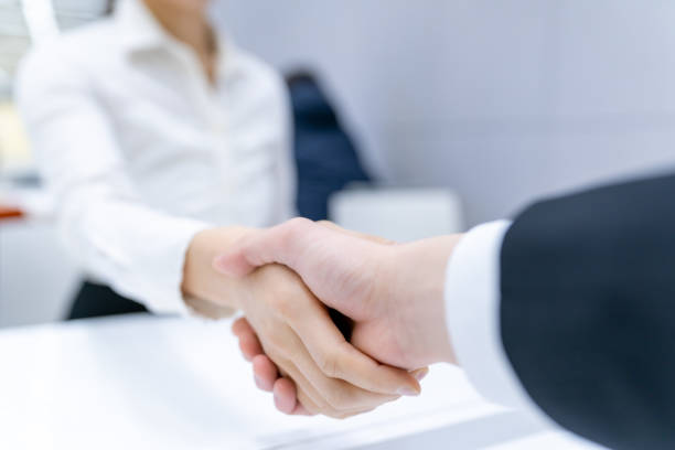 istock Handshake, Asian business people 1213046005