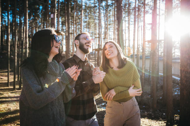 istock Young people hang out in nature, hugging and smiling ... 1213048299