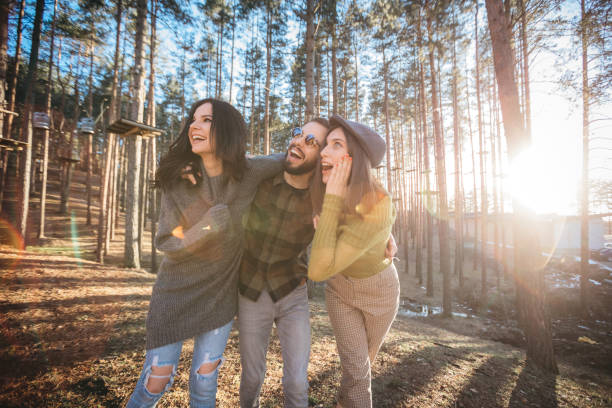 istock Young people hang out in nature, hugging and smiling ... 1213048312