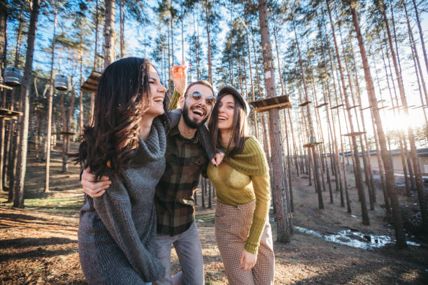 istock Young people hang out in nature, hugging and smiling ... 1213050218