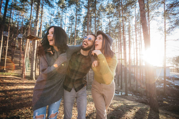 istock Young people hang out in nature, hugging and smiling ... 1213050273