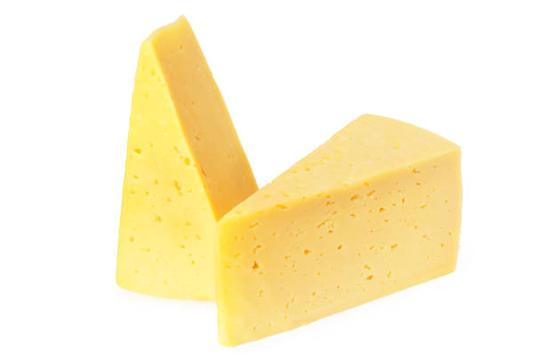 istock Cut of cheese isolated on a white background 1213052060