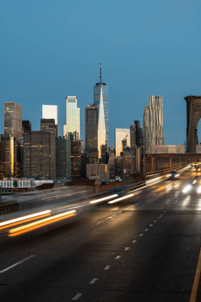istock Lower Manhattan Skyline at Sunrise from Brooklyn Bridge 1213067392
