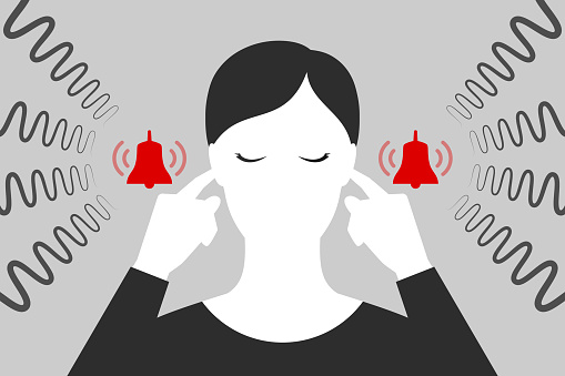 Woman with closed eyes is plugging her ears with fingers when suffering from tinnitus. Red bells as symbol of unbearable ringing in ears. Concept of diseases of hearing organs or neurology problems