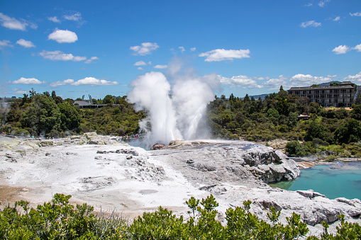 Pohutu Geyser and Prince of Wales Feathers Geyser erupt in the Whakarewarewa geothermal area of Rotorua.The Prince of Wales Feathers Geyser is on an angle.