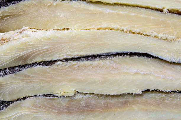 istock Pile of dried and salted codfish fillets 1213083659