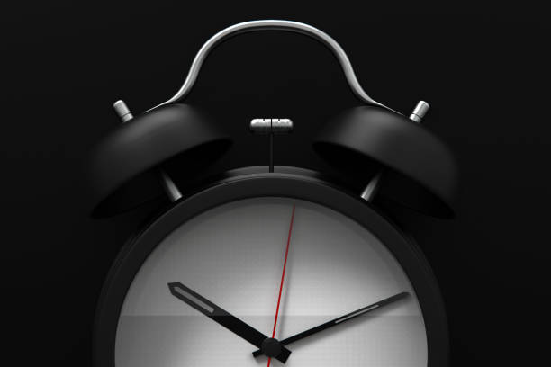 istock 3d rendering alarm clock on black background stock photo 1213085278