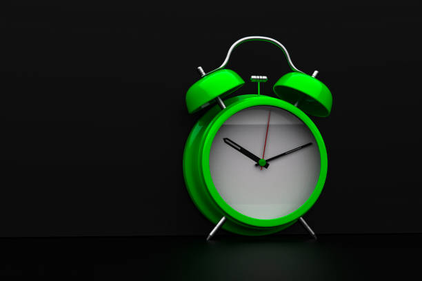 istock 3d rendering alarm clock on black background stock photo 1213085283