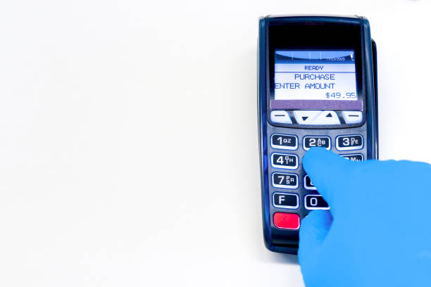 istock Gloved Hand Using Retain Credit Card Terminal 1213091567