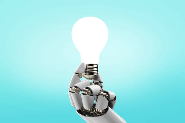 istock Inspiration - Light Bulb Robot Hand Idea on Blue Background stock photo 1213100693