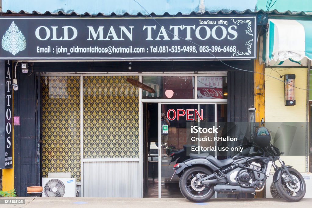 Motorbike Outside A Tattoo Studio Stock Photo - Download Image Now -  Motorcycle, Studio - Workplace, Tattoo - iStock