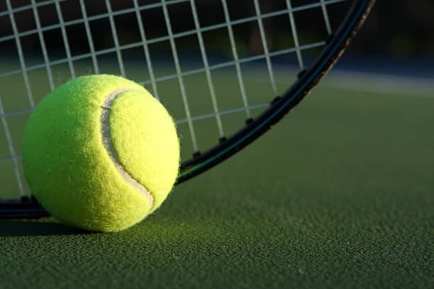 istock Tennis Ball and Racket 121311037