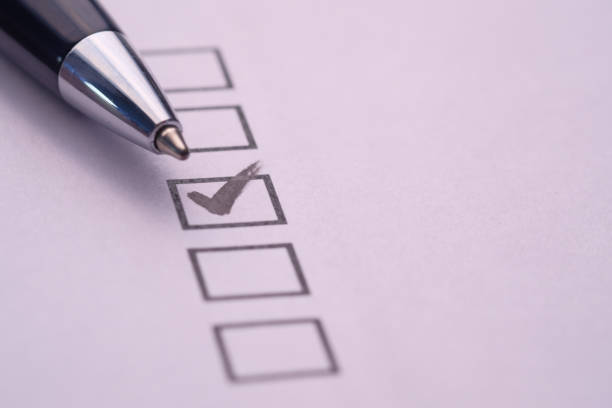 istock check mark on paper with black pen 1213111214