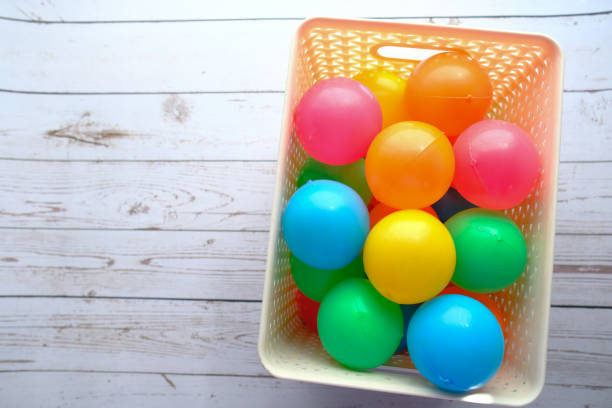 istock top view of colorful plastic ball in a box 1213119120