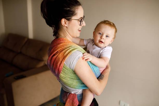 istock Young mother hugging her baby 1213119517