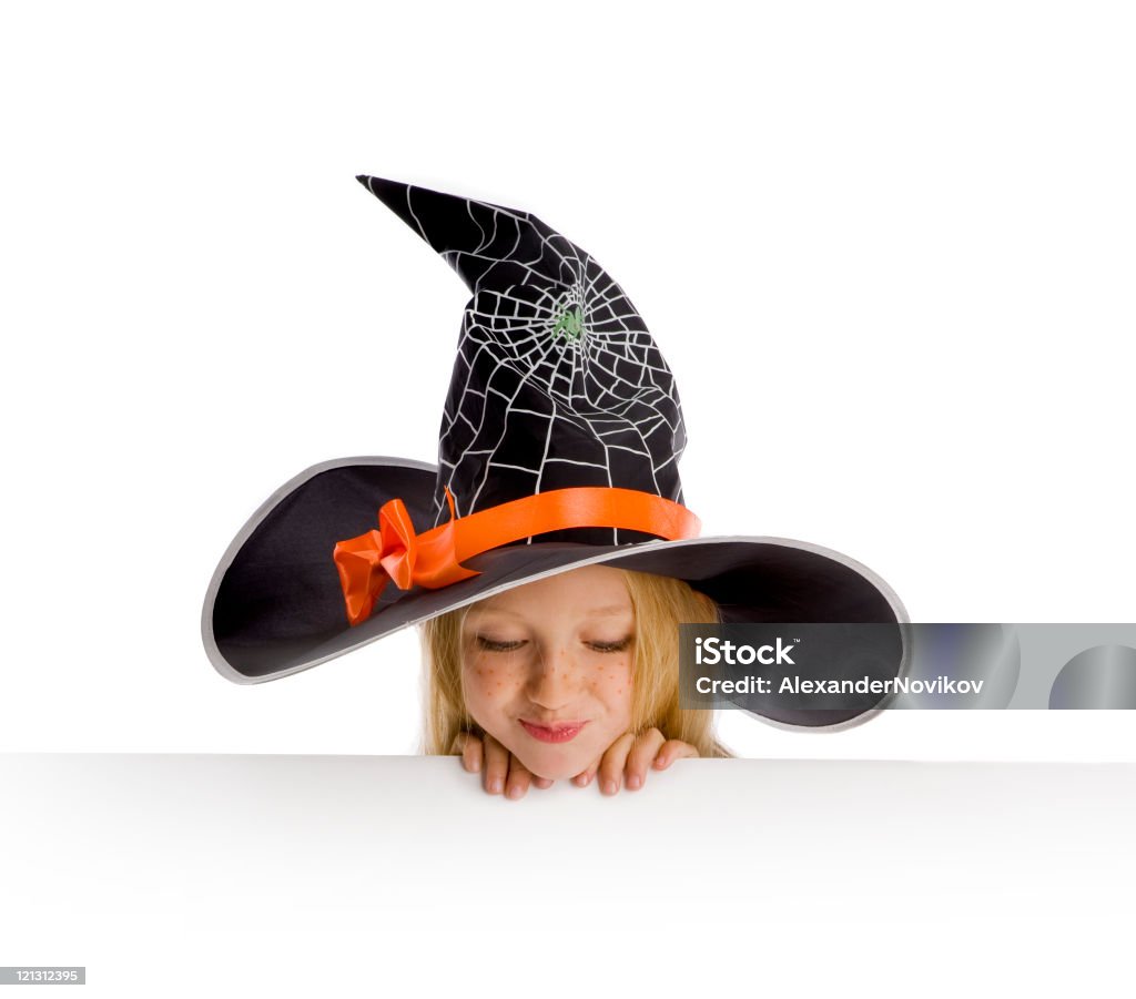 Little funny witch holding a sign.  Autumn Stock Photo