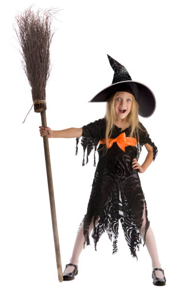 istock Little surprised witch holding a broom. 121312436