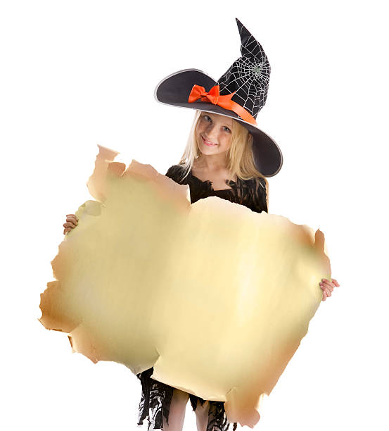 istock Little happy witch holding a sign. 121312490