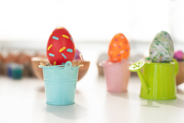 istock Three of Easter eggs painted decoration with colorful on pot 1213129590